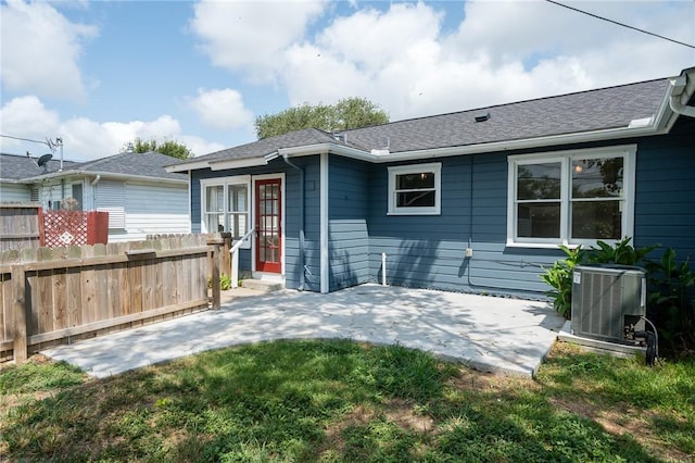 909 Cunningham St, Corpus Christi, TX 78411 - back of house with cooling unit and a patio area