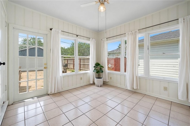 909 Cunningham St, Corpus Christi, TX 78411 - unfurnished sunroom with tile patterned floors and healthy amount of natural light