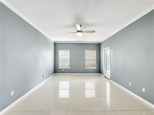 tiled empty room featuring ceiling fan and crown molding