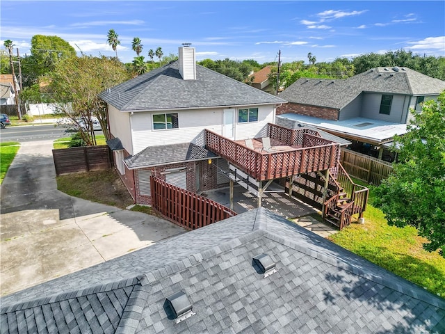 exterior space featuring a wooden deck