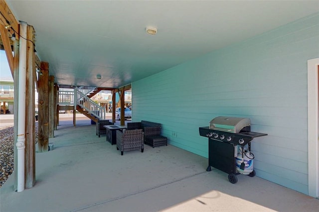 view of patio / terrace with outdoor lounge area and a grill