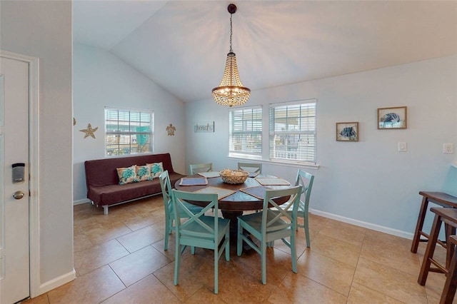 dining room featuring light tile patterned flooring and lofted ceiling