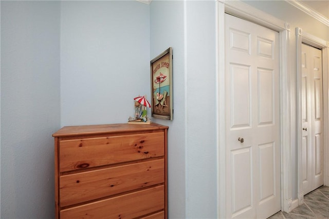 corridor featuring ornamental molding
