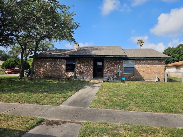 ranch-style house with a front yard