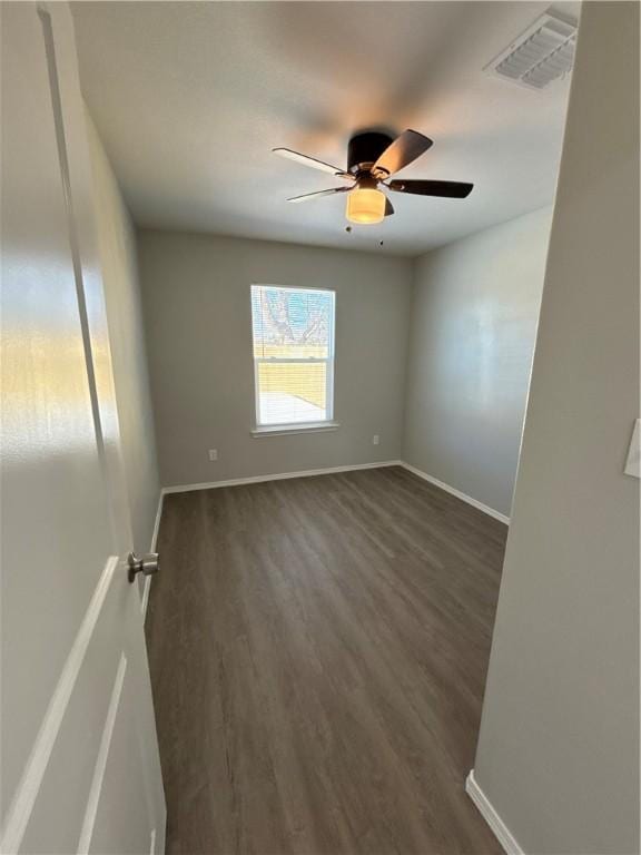 110 Josephine St, Corpus Christi, TX 78401 - empty room featuring dark wood finished floors, baseboards, and ceiling fan