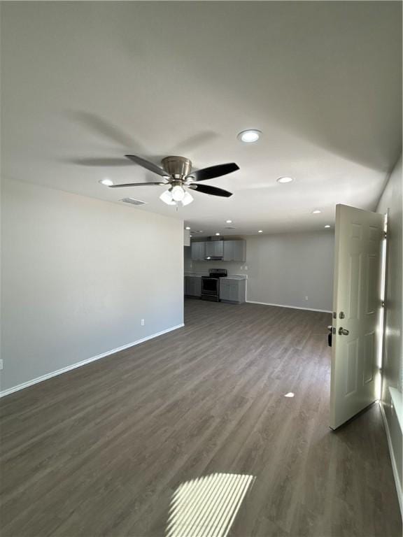 110 Josephine St, Corpus Christi, TX 78401 - unfurnished living room featuring baseboards, dark wood-type flooring, recessed lighting, and ceiling fan