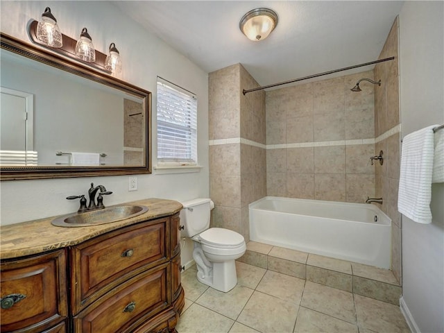 full bathroom featuring tile patterned flooring, vanity, toilet, and tiled shower / bath