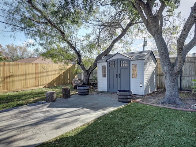 view of outbuilding featuring a yard