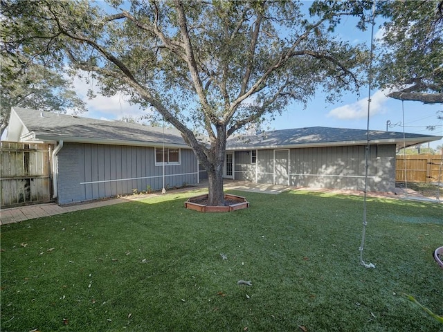 view of yard with a sunroom