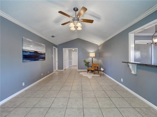 unfurnished room featuring light tile patterned floors, crown molding, ceiling fan, and lofted ceiling