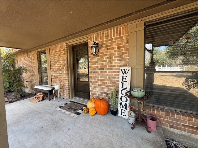 entrance to property with covered porch