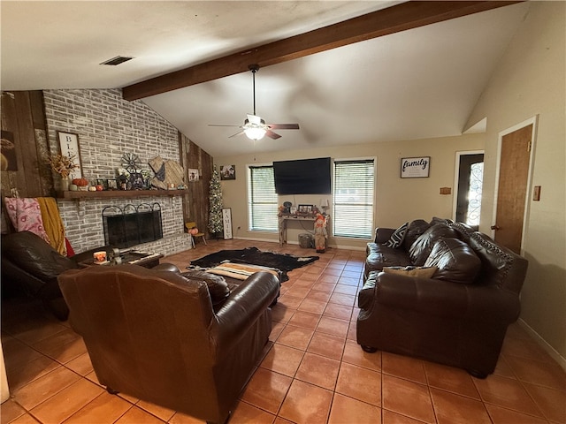 tiled living room with a fireplace, vaulted ceiling with beams, and ceiling fan