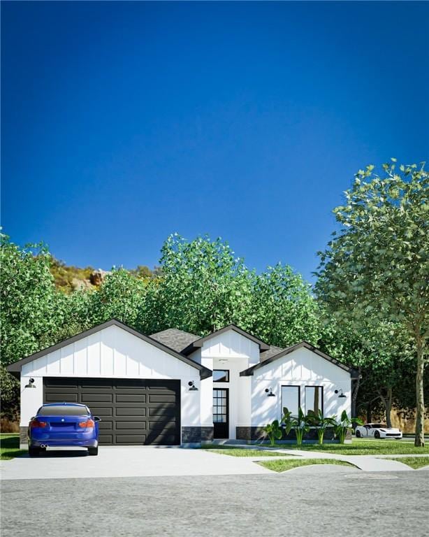 view of front facade featuring board and batten siding and an attached garage