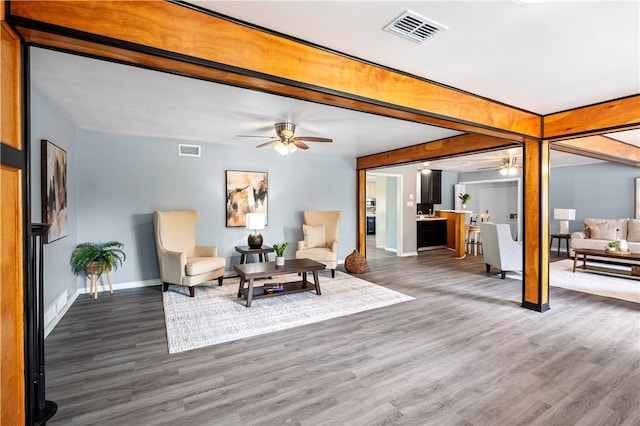 10946 Birdwood, Corpus Christi, TX 78410 - sitting room with a ceiling fan, wood finished floors, and baseboards