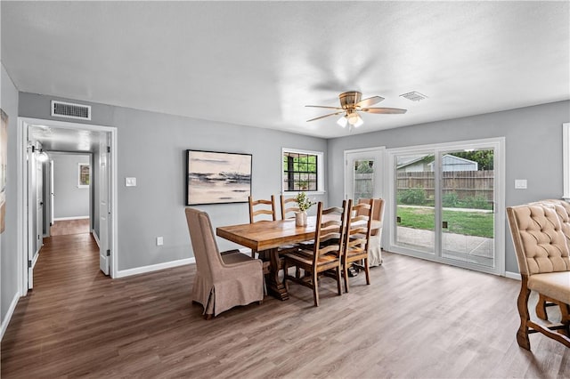 10946 Birdwood, Corpus Christi, TX 78410 - dining space featuring wood finished floors, a ceiling fan, and baseboards