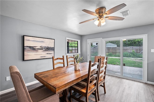 10946 Birdwood, Corpus Christi, TX 78410 - dining area featuring wood finished floors, baseboards, and a ceiling fan