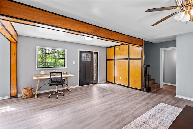 10946 Birdwood, Corpus Christi, TX 78410 - living area featuring wood finished floors, baseboards, ceiling fan, stairway, and an office area