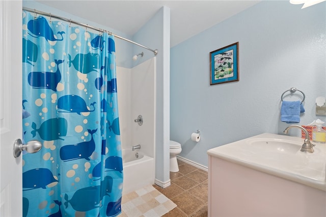 full bathroom featuring vanity, shower / bath combo with shower curtain, tile patterned flooring, and toilet