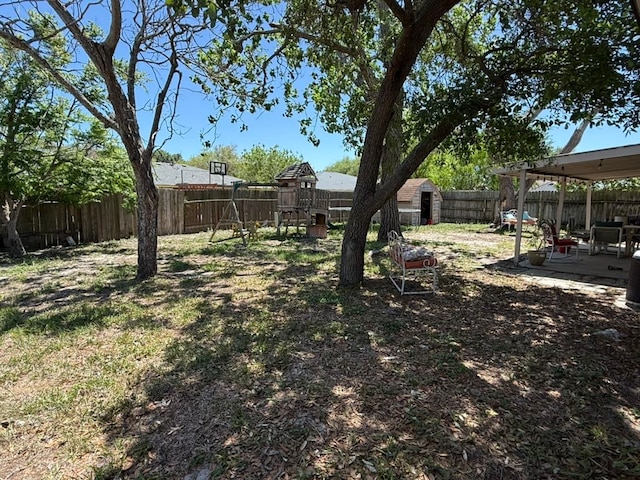 view of yard featuring a patio and a fenced backyard