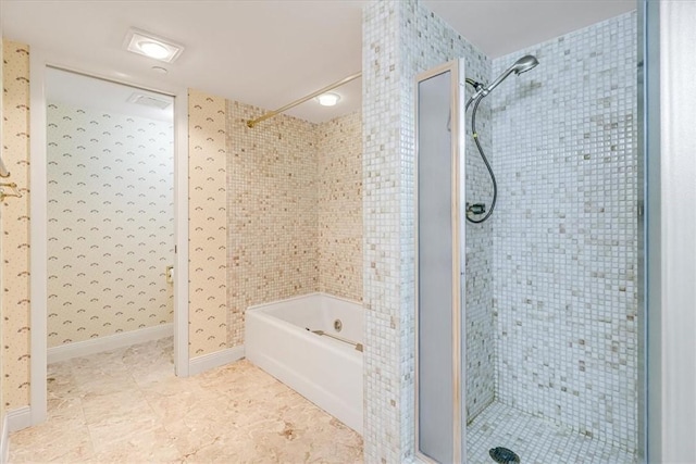 4350 Ocean Dr Unit 103, Corpus Christi, TX 78412 - full bathroom featuring a stall shower, tile patterned flooring, and a washtub