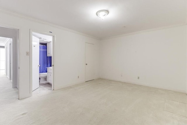4350 Ocean Dr Unit 103, Corpus Christi, TX 78412 - spare room with light colored carpet, ornamental molding, and baseboards