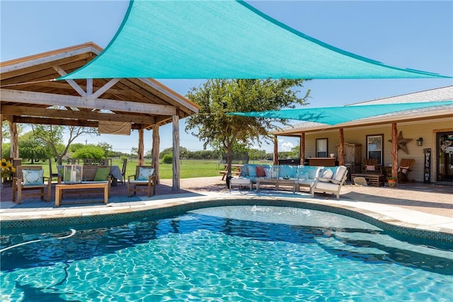 outdoor pool featuring a patio area and a gazebo