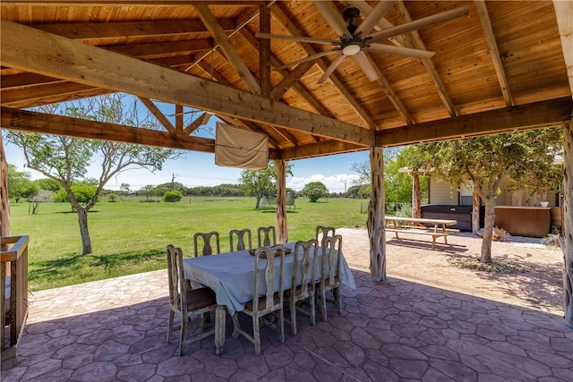 view of patio featuring a rural view and outdoor dining area