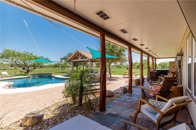 view of patio with visible vents, an outdoor pool, and a gazebo