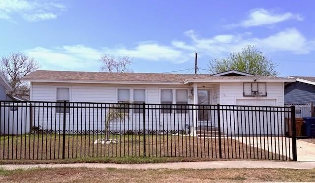1125 Woodlawn Dr, Corpus Christi, TX 78412 - view of front of home featuring a fenced front yard