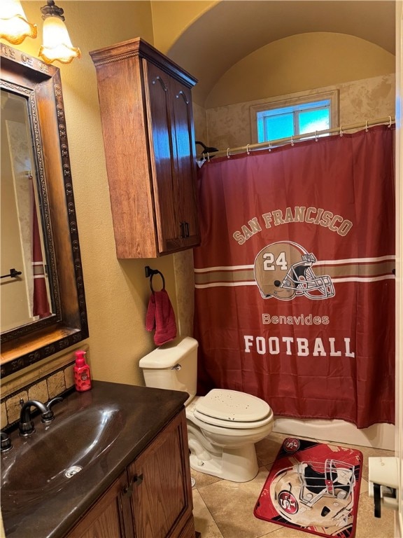 bathroom with vanity, tile patterned flooring, toilet, and a shower with curtain