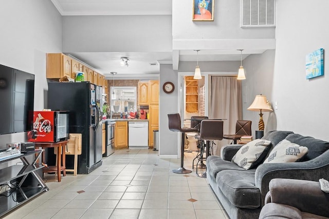 living room featuring visible vents and light tile patterned floors