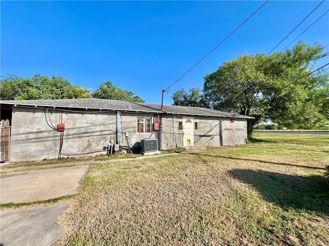 view of outbuilding with central air condition unit