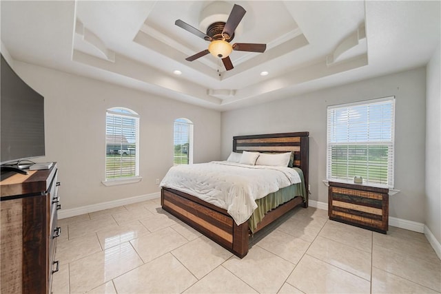 3941 Cobb Ln, Robstown, TX 78380 - bedroom featuring a tray ceiling, baseboards, light tile patterned floors, ceiling fan, and recessed lighting