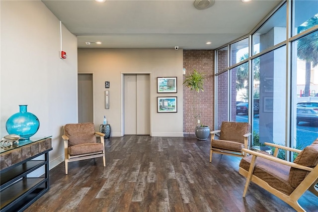 715 S Upper Broadway St Unit 202, Corpus Christi, TX 78401 - lobby featuring recessed lighting, a surveillance system, a wall of windows, and brick wall
