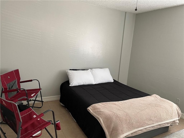 715 S Upper Broadway St Unit 202, Corpus Christi, TX 78401 - bedroom with baseboards and a textured ceiling