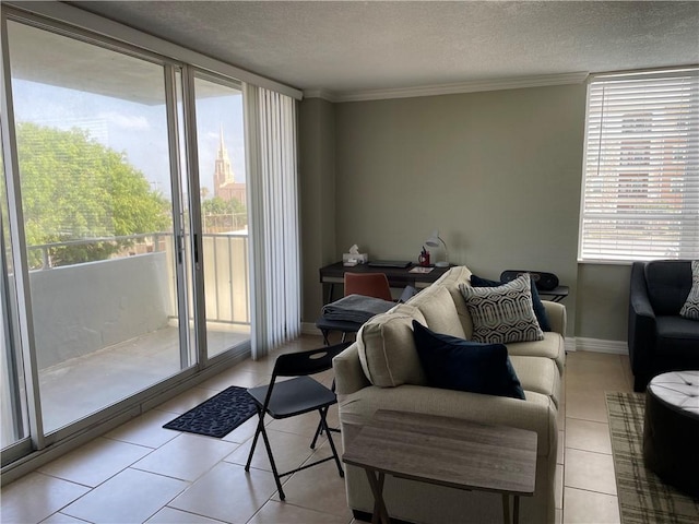 715 S Upper Broadway St Unit 202, Corpus Christi, TX 78401 - living area with a textured ceiling, light tile patterned flooring, and crown molding
