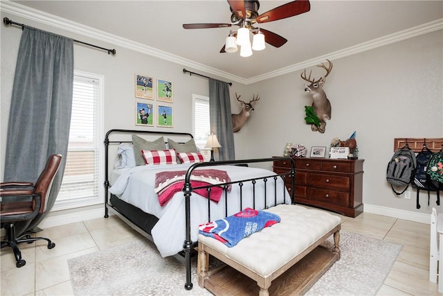 bedroom with ornamental molding, ceiling fan, baseboards, and light tile patterned floors