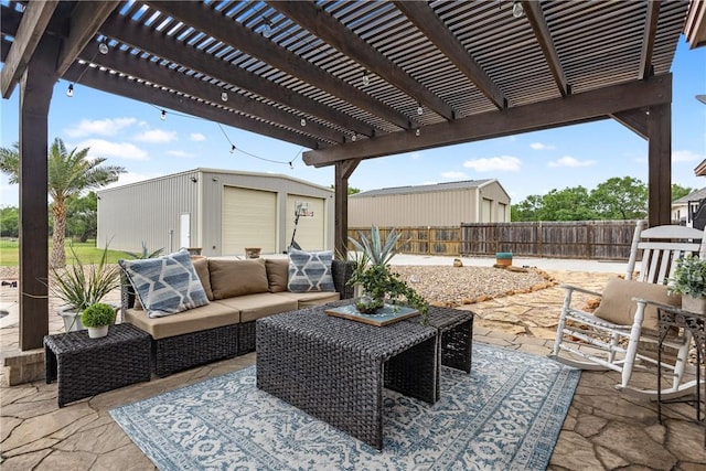 view of patio / terrace featuring an outdoor living space, a fenced backyard, an outdoor structure, and a pergola