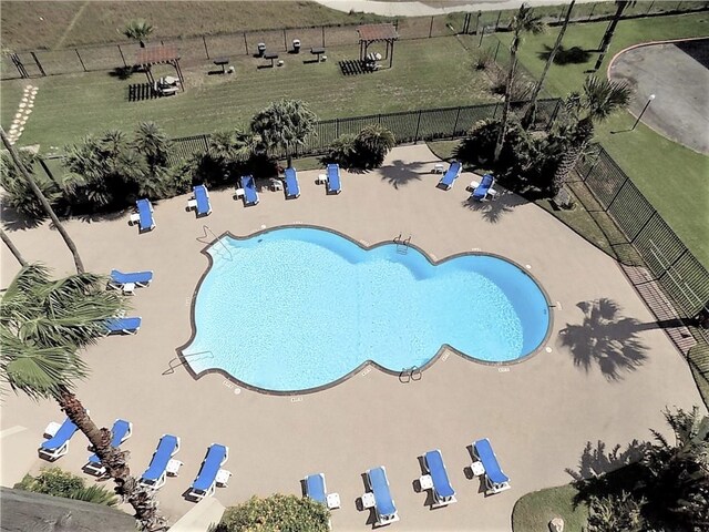 view of pool featuring a patio area