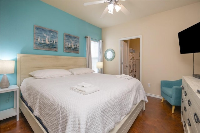 bedroom featuring ceiling fan and ensuite bathroom