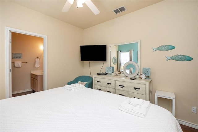 bedroom featuring ensuite bathroom and ceiling fan