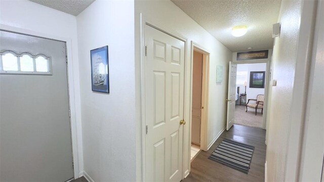 134 Daniel Moore St, Portland, TX 78374 - hall with a textured ceiling and wood finished floors