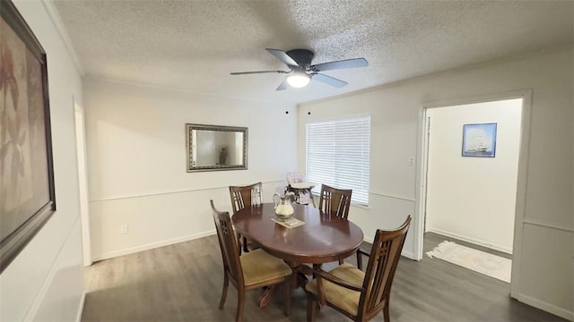 134 Daniel Moore St, Portland, TX 78374 - dining space featuring wood finished floors, a textured ceiling, and a ceiling fan