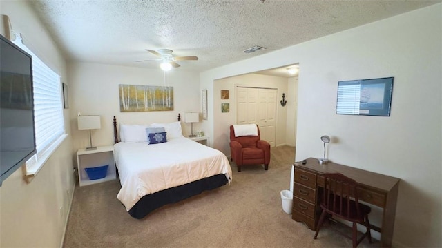 134 Daniel Moore St, Portland, TX 78374 - carpeted bedroom featuring a textured ceiling and ceiling fan