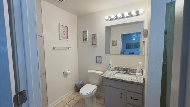 134 Daniel Moore St, Portland, TX 78374 - bathroom with vanity, tile patterned floors, and a ceiling fan