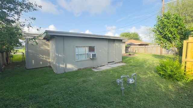 134 Daniel Moore St, Portland, TX 78374 - rear view of house with a fenced backyard and cooling unit