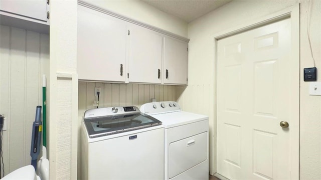 134 Daniel Moore St, Portland, TX 78374 - laundry room featuring separate washer and dryer and cabinet space