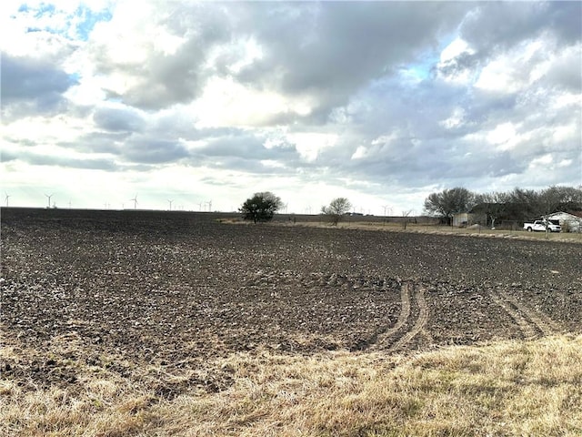 view of yard with a rural view