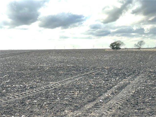 view of yard with a rural view