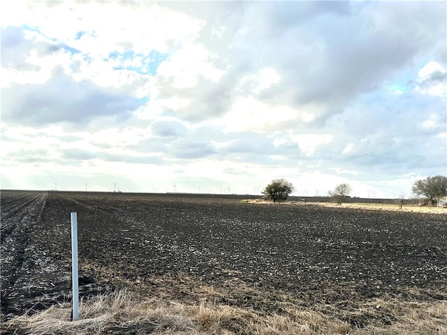 view of yard with a rural view